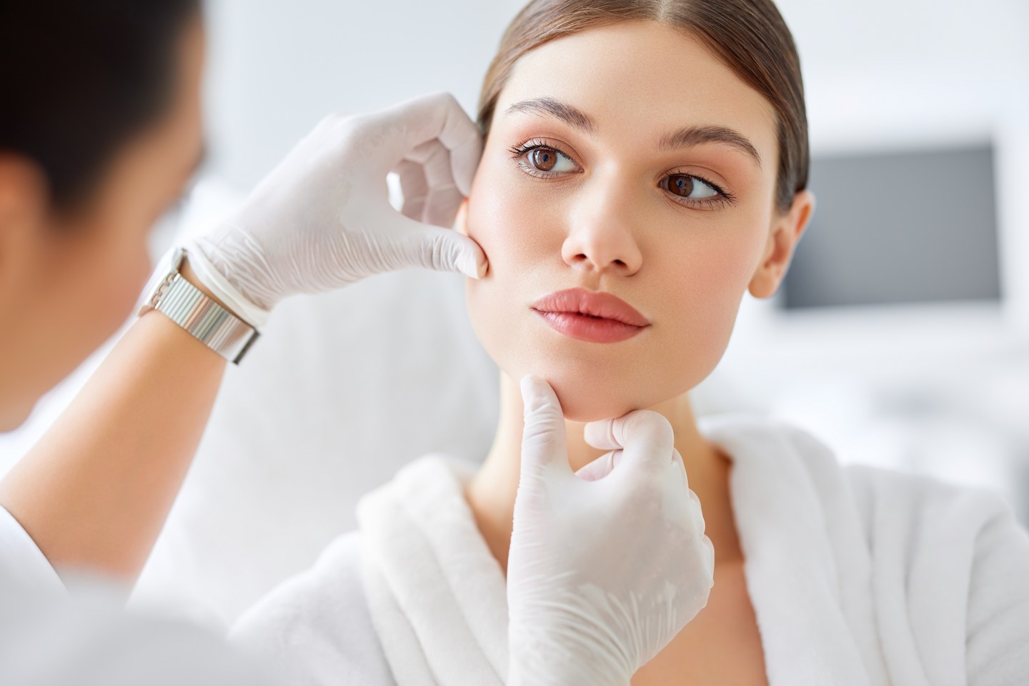 DermLegal Professional facial skin analysis and dermatological treatment for a patient.